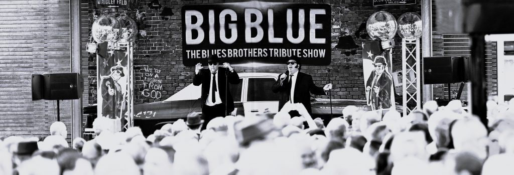 Big Blue ist selbstverständlich auch für Events buchbar Die Big Blue Blues Brothers™ Tribute Show ist auf vielen deutschen Bühnen zu sehen und bringt das Kultgefühl von Chicago direkt in Ihre Stadt. Ob für Firmenfeiern, private Veranstaltungen, Galaabende oder große Konzerte – Big Blue sorgt auf jedem Event für ein unvergessliches Erlebnis. Feiern Sie mit uns das 45-jährige Jubiläum der Blues Brothers™ und lassen Sie sich von einer Show begeistern, die das Erbe der Musiklegenden lebendig hält.